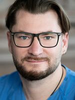 Portraitfoto von Aliaksandr Yurkou