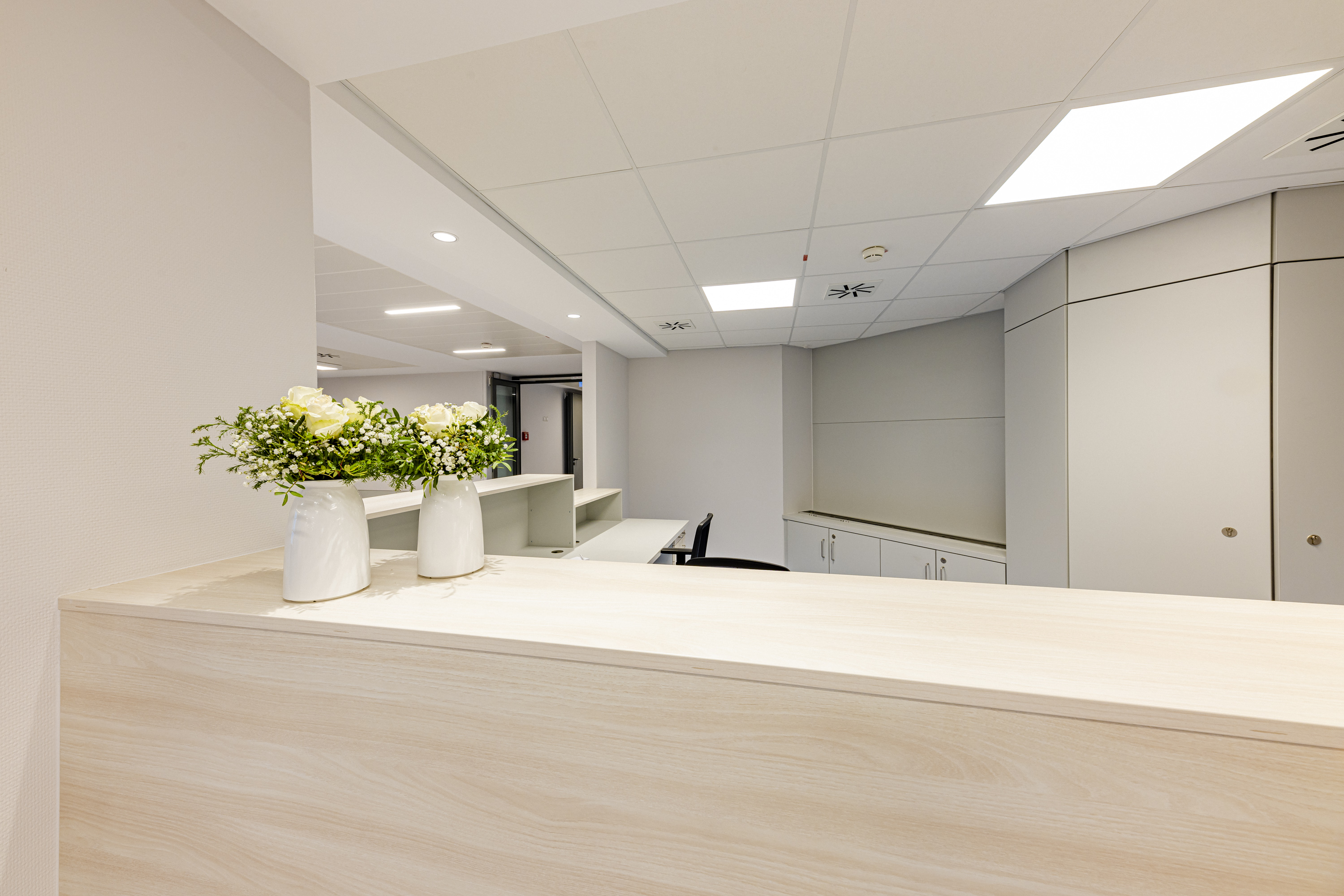 Bild der Innovationsstation Anmeldung helles Holz freundlich